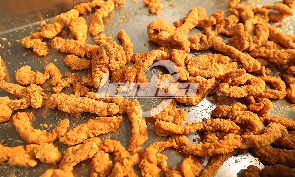 Freidora continua industrial para líneas automáticas de fritura