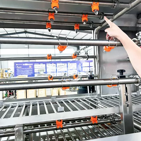 Lavadora de cajas con retorno automático