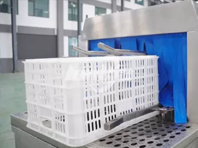 Máquina lavadora de cajas