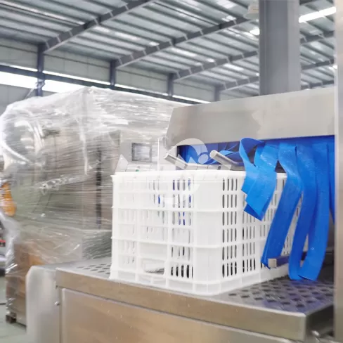 Máquina lavadora de cajas