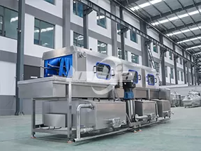 Máquina lavadora de cajas
