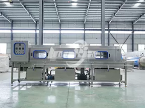 Máquina lavadora de cajas